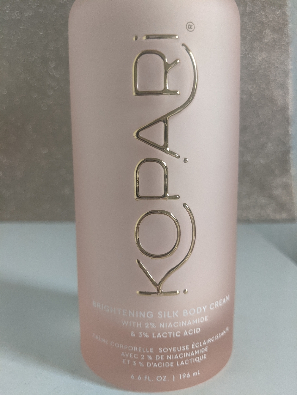 Kopari Brightening Silk Body Cream - White with Blush Pink Logo - Picture 8 of 11